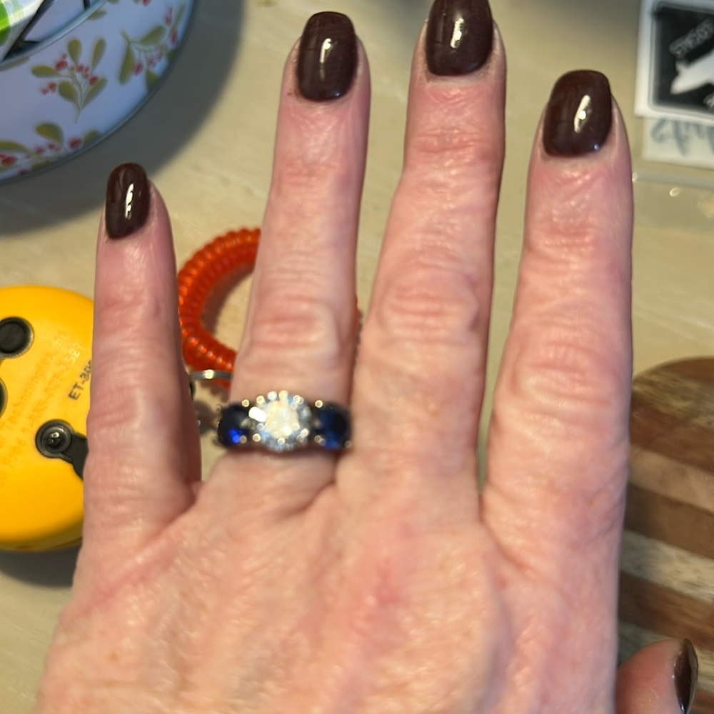 Moissanite three stone engagement ring from Etsy